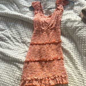 coral pink and white floral mini dress with ruffles